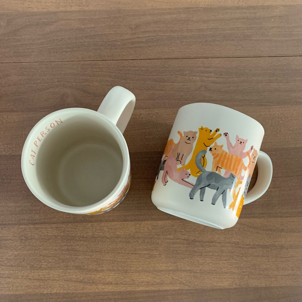 2 cat person mugs